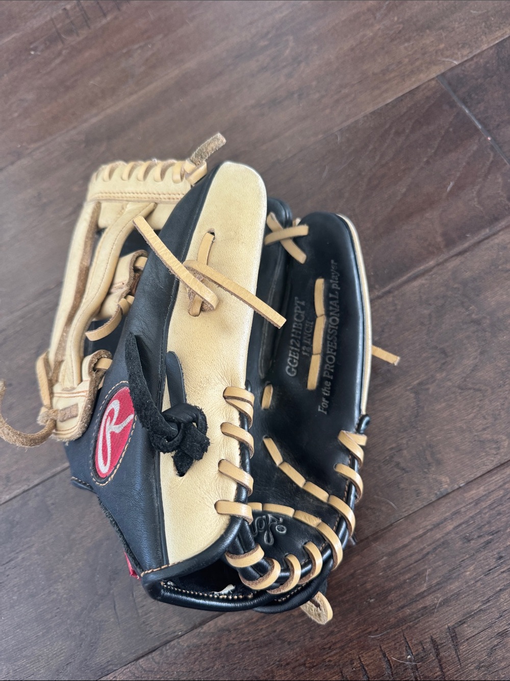 Rawlings Youth Two-Tone Black and Tan Baseball Glove with Red Patch